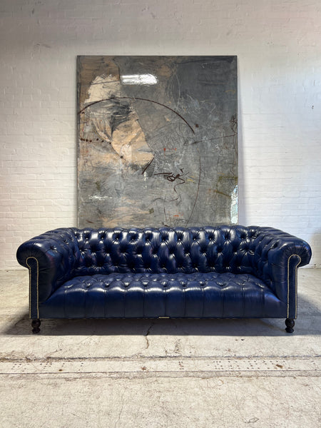 Navy leather chesterfield sofa deals
