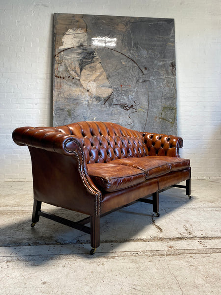 A Stunning MidC Chippendale Camel Back Hand Dyed Leather Sofa