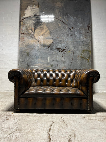 A Very Nice Twice Loved Vintage 2 Seat Leather Chesterfield Sofa in Dark Saddle Tan