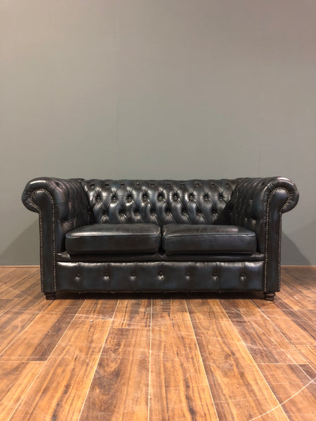 A lovely little 2 Seater Leather Sofa in Navy Blue