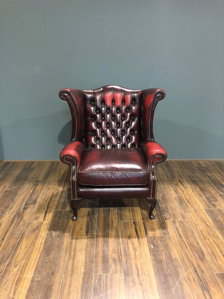 A Very Elegant Leather Chesterfield Wing Back Chair