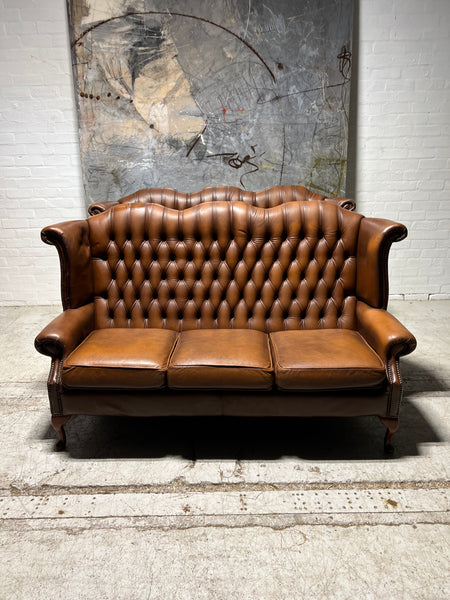 Beautiful Pair of Twice loved Chesterfield Wing Back Sofas in Caramel Tan