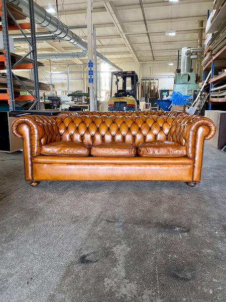 A Very Handsome Matching Pair of MidC Chesterfield Sofas
