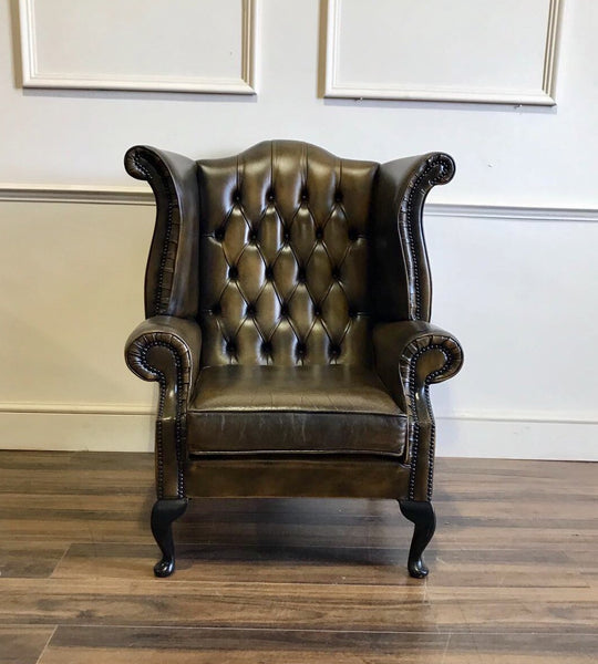 Front view of the Saddle Tan Wing Back Chair