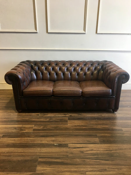 Brown leather chesterfield sofa 