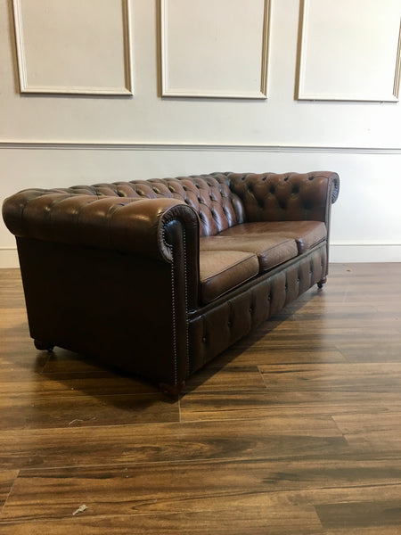A Super Matching Pair of Leather Chesterfield Wing Back Chairs