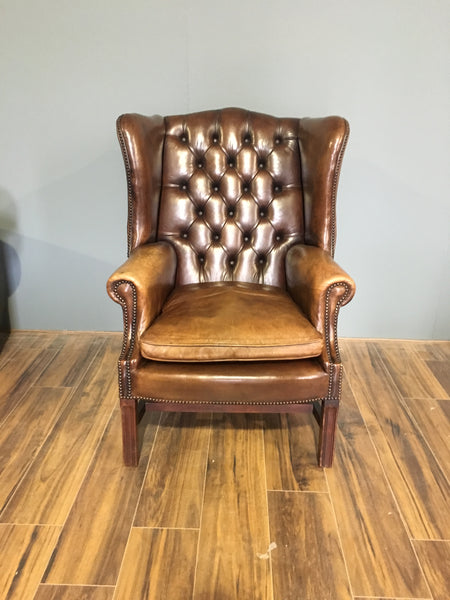 An Exceptional Vintage Leather Chesterfield Wing Chair