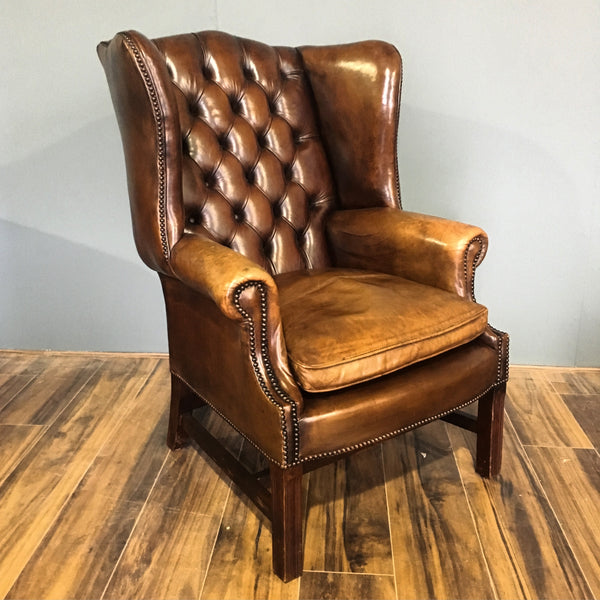 An Exceptional Vintage Leather Chesterfield Wing Chair