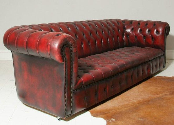 FULLY BUTTONED OXBLOOD FOUR SEATER