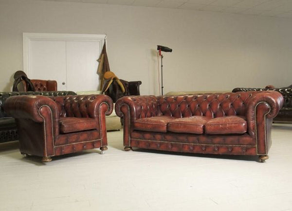 EXCEPTIONAL OXBLOOD COIL SPRUNG SOFA